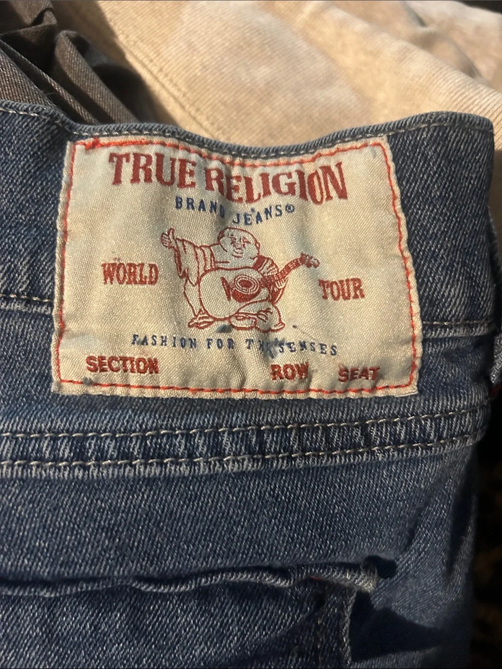 True Religion Men's Light Blue Slim Straight Jeans with Flap Back Pockets